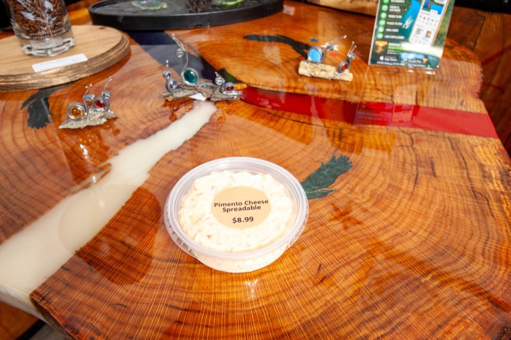A tub of house-made pimento cheese spread